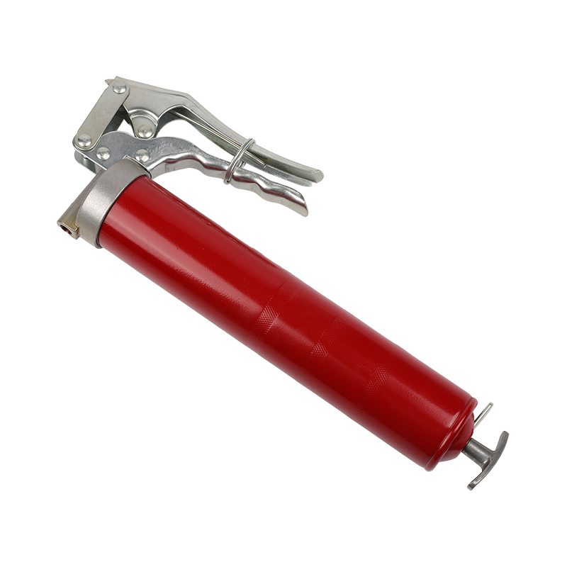 Pistol grip grease gun with flexible hose