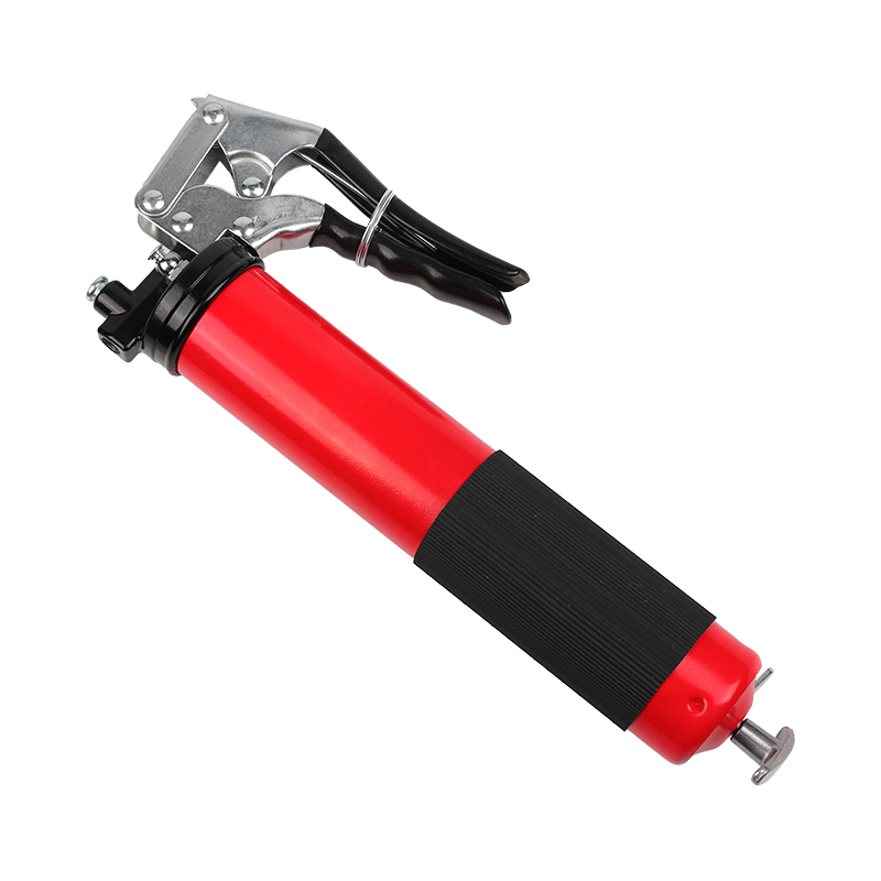 Pistol grip grease gun with flexible hose