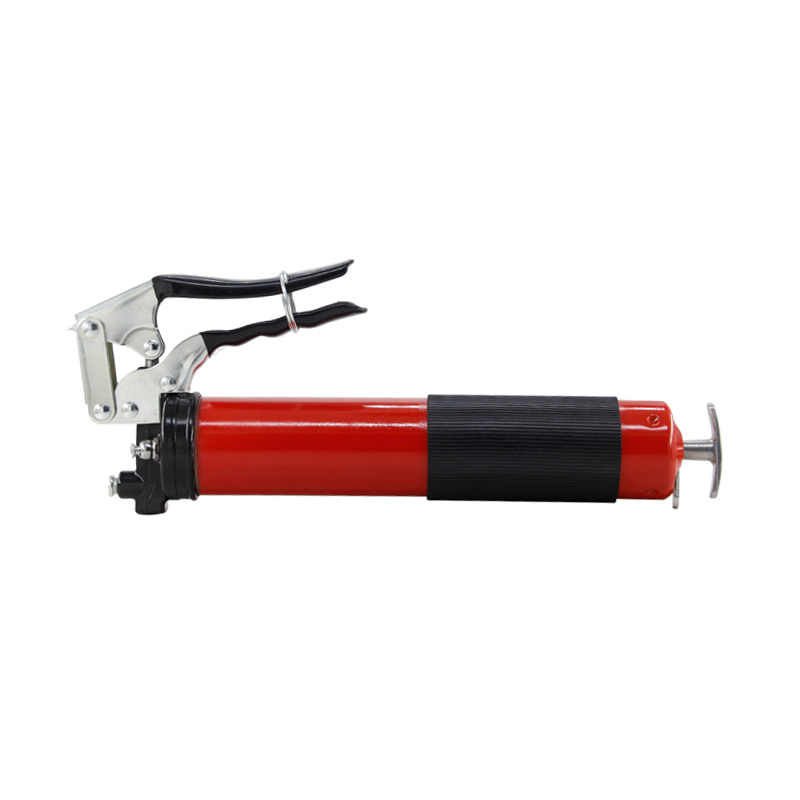 Pistol grip grease gun with flexible hose