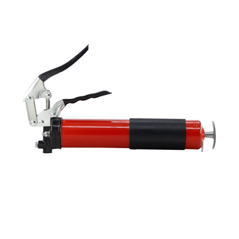 Pistol grip grease gun with flexible hose