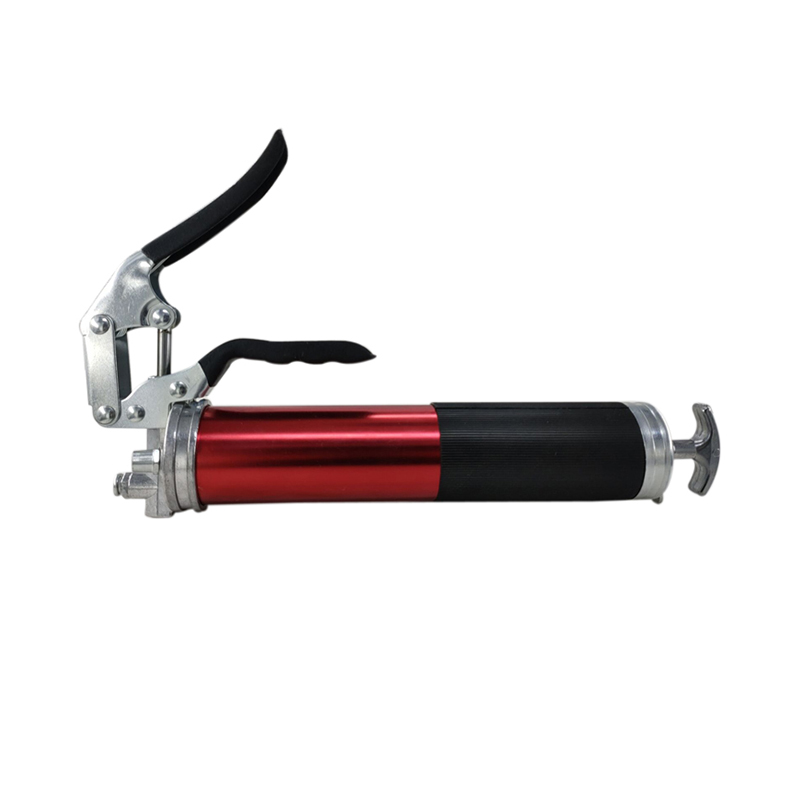 Pistol grip grease gun with flexible hose