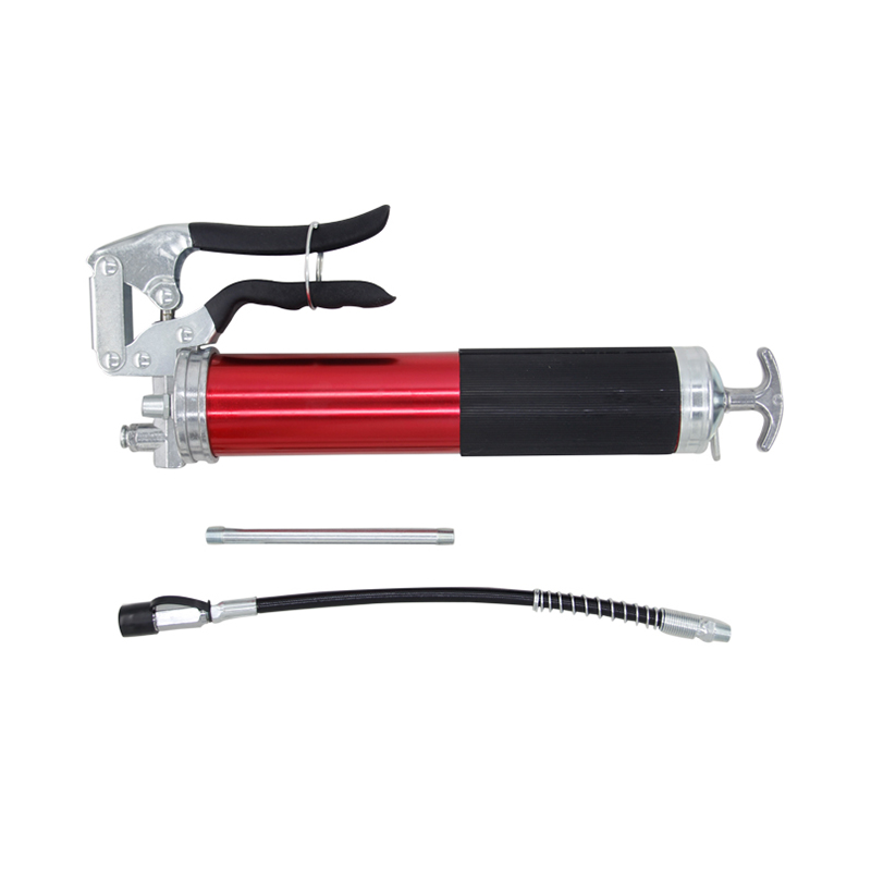 Pistol grip grease gun with flexible hose